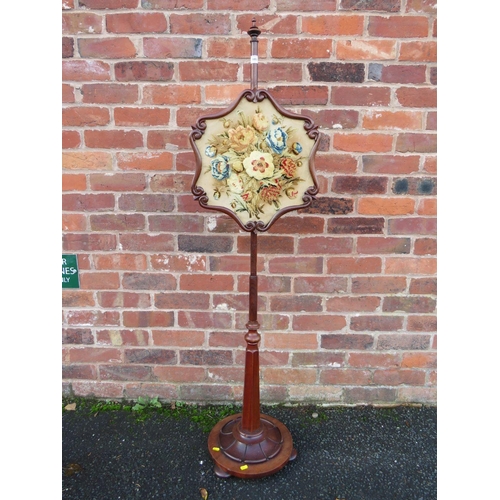 603 - A VICTORIAN MAHOGANY POLE SCREEN