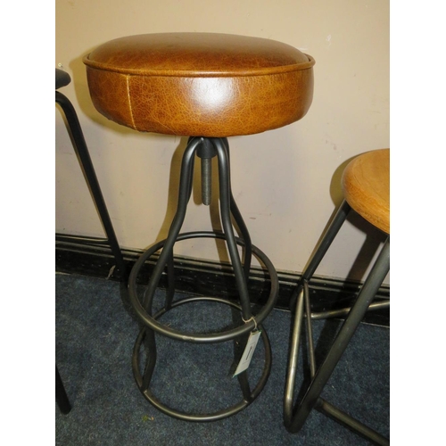 608 - A MODERN INDUSTRIAL STYLE BROWN LEATHER TOPPED STOOL AND AN INDUSTRIAL METAL AND WOOD EXAMPLE (2)