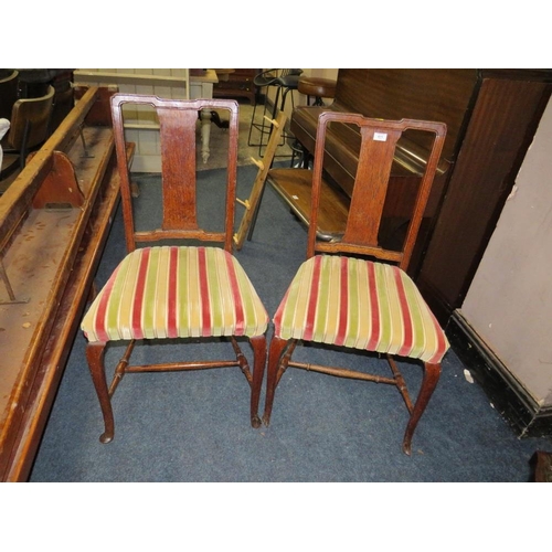 611 - A PAIR OF OAK BEDROOM CHAIRS