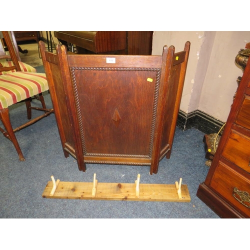 612 - A VINTAGE OAK FIRESCREEN AND AN UNUSUAL COAT/HAT RACK, WALKING STICK...