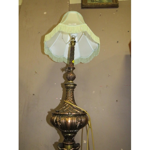 613 - AN UNUSUAL METAL STANDARD LAMP AND SHADE