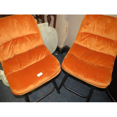 624 - A PAIR OF MODERN BURNT ORANGE KITCHEN STOOLS