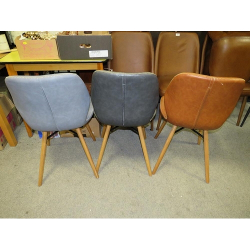 652 - A MODERN HARLEQUIN SET OF THREE CHAIRS