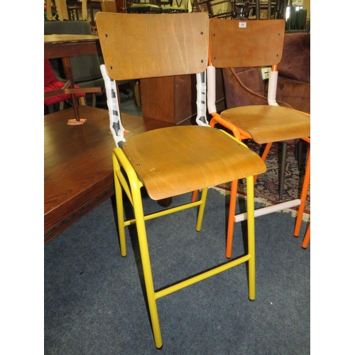 666 - A HARLEQUIN SET OF FOUR INDUSTRIAL STYLE BAR STOOLS