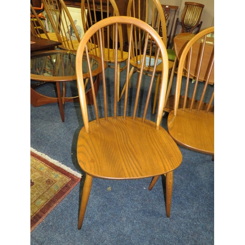 671 - A SET OF FOUR ERCOL WINDSOR CHAIRS