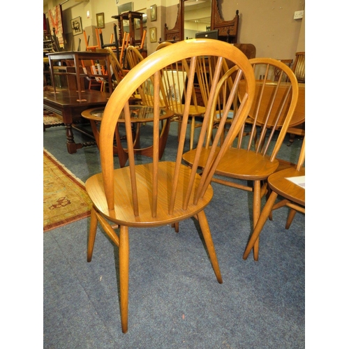 671 - A SET OF FOUR ERCOL WINDSOR CHAIRS