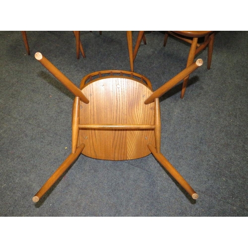 671 - A SET OF FOUR ERCOL WINDSOR CHAIRS