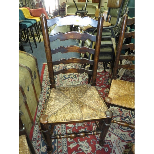 678 - A SET OF FOUR OAK WICKERSEAT DINING CHAIRS