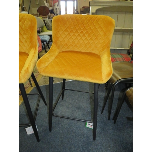 688 - A PAIR OF MODERN MUSTARD UPHOLSTERED KITCHEN STOOLS