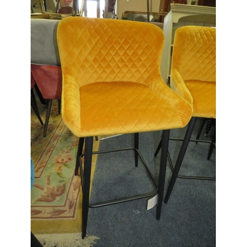 688 - A PAIR OF MODERN MUSTARD UPHOLSTERED KITCHEN STOOLS