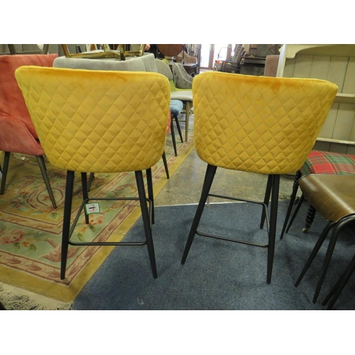 688 - A PAIR OF MODERN MUSTARD UPHOLSTERED KITCHEN STOOLS