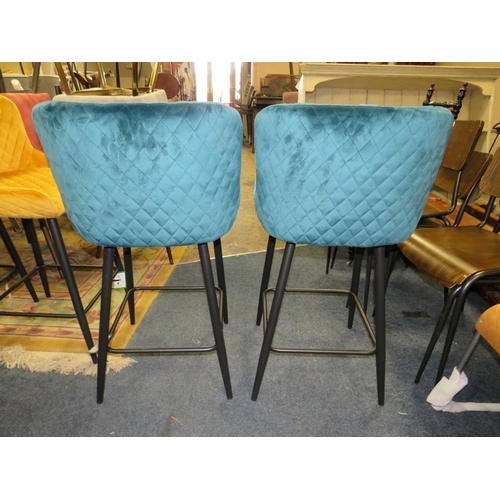 689 - A PAIR OF MODERN GREEN UPHOLSTERED KITCHEN STOOLS