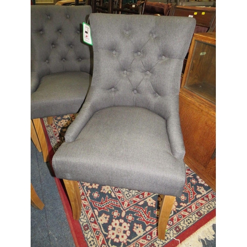 695 - A SET OF FOUR MODERN UPHOLSTERED DINING CHAIRS