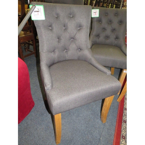 695 - A SET OF FOUR MODERN UPHOLSTERED DINING CHAIRS