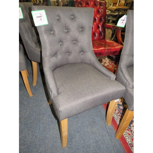 695 - A SET OF FOUR MODERN UPHOLSTERED DINING CHAIRS