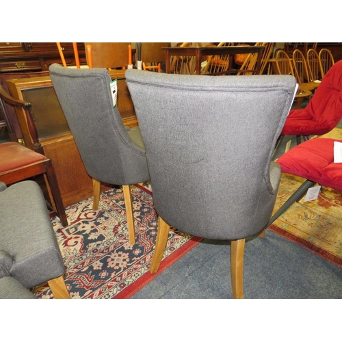 695 - A SET OF FOUR MODERN UPHOLSTERED DINING CHAIRS