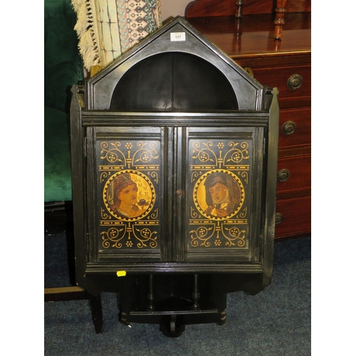 697 - AN EDWARDIAN EBONISED AESTHETIC PERIOD HANGING CORNER CUPBOARD - H 99 CM