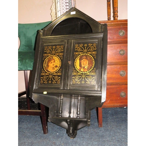 697 - AN EDWARDIAN EBONISED AESTHETIC PERIOD HANGING CORNER CUPBOARD - H 99 CM