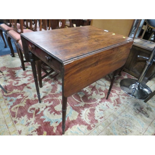 699 - A 19TH CENTURY MAHOGANY PEMBROKE TABLE RAISED ON TURNED SUPPORTS