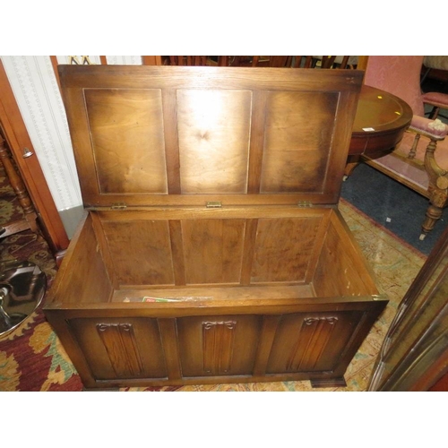 705 - A REPRODUCTION DRUM TABLE, VINTAGE CHINA CABINET AND AN OAK BLANKET BOX (3)