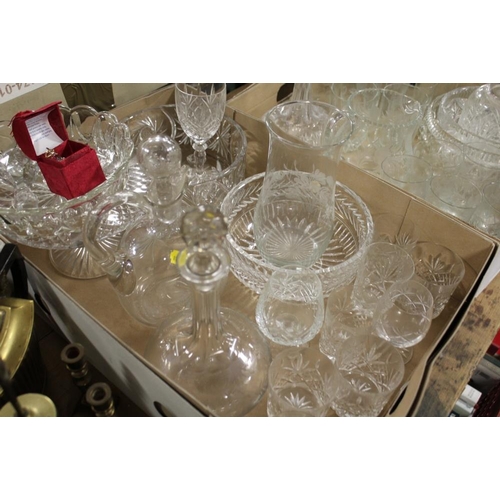 94 - THREE TRAYS OF ASSORTED GLASSWARE TO INCLUDE A LEMONADE JUG AND GLASSES, CUT GLASS BOWLS, DECANTERS ... 