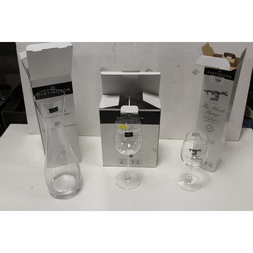 169 - THREE BOXED DARTINGTON CRYSTAL GLASSWARE ITEMS TO INCLUDE A DECANTER AND WINE GLASSES