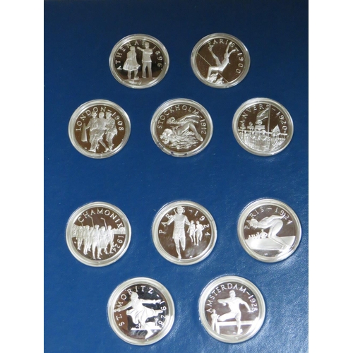 231 - THE OFFICIAL HISTORY OF THE OLYMPIC GAMES LIMITED EDITION SOLID SILVER PROOF SET CONTAINING FIFTY CA... 