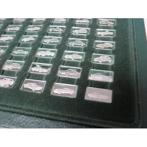 241 - A CASED SET OF 100 MINIATURE SILVER CAR DESIGN INGOTS STAMPED 925 / 1000