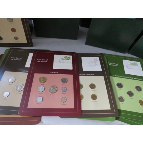 243 - FOUR EMBOSSED VOLUMES OF THE COIN SETS OF ALL NATIONS CONTAINING 'FRESH SETS OF CIRCULATING COINAGE ... 