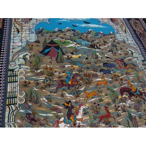 632 - A LARGE MODERN EASTERN SILK RUG DECORATED WITH A MOUNTAINOUS HUNTING SCENE 250 X 360