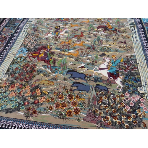 632 - A LARGE MODERN EASTERN SILK RUG DECORATED WITH A MOUNTAINOUS HUNTING SCENE 250 X 360