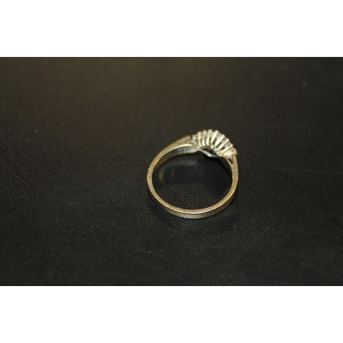 262 - A 9CT GOLD DIAMOND CLUSTER RING, APPROX 2.6 G