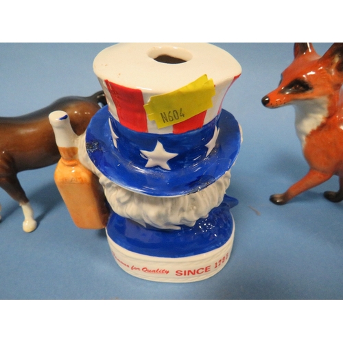 329 - A ROYAL DOULTON JIM BEAM UNCLE SAM BOURBON FLASK TOGETHER WITH A STANDING FOX AND BROWN HORSE - ALL ... 