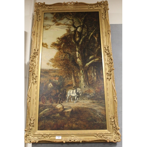 17 - A TALL GILT FRAMED OIL ON CANVAS OF AN EXTENSIVE COUNTRY LANDSCAPE WITH A LOG CART SIGNED LOWER RIGH... 