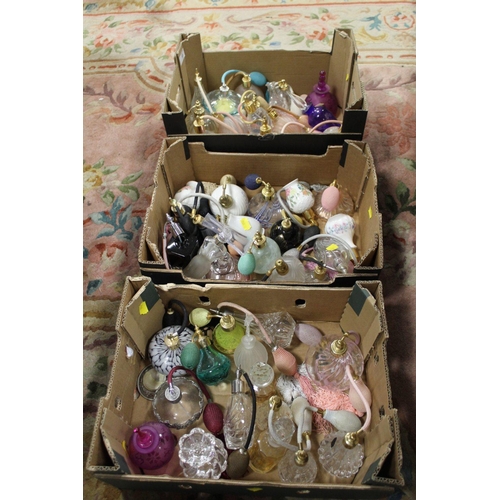 65 - A COLLECTION OF THREE TRAYS OF  ASSORTED SCENT BOTTLES, ATOMIZERS ETC TO INCLUDE CAITHNESS, STEWART ... 