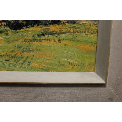 7 - JOHN ALFORD - A FRAMED OIL ON BOARD OF A COUNTRY LANDSCAPE