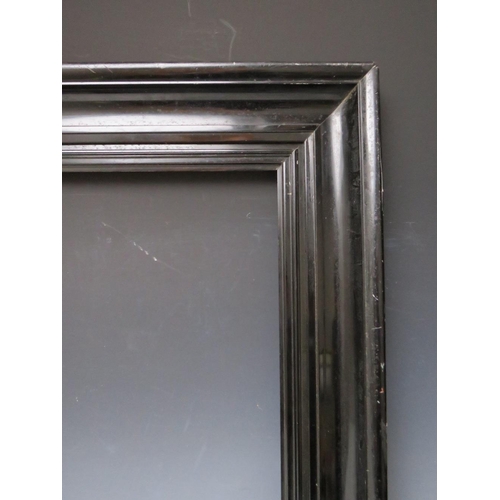 100 - A LATE 19TH / EARLY 20TH CENTURY EBONISED DUTCH FRAME, with black slip, frame W 6.5 cm, rebate 38.5 ... 