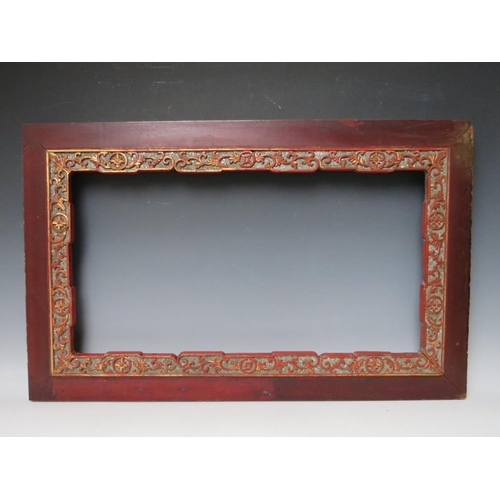 101 - A 19TH CENTURY ORIENTAL WOODEN FRAME, with decorative gold inner, frame W 9 cm, rebate 70 x 40 cm