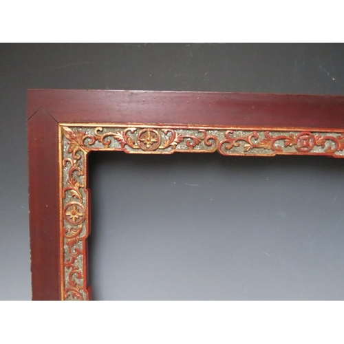 101 - A 19TH CENTURY ORIENTAL WOODEN FRAME, with decorative gold inner, frame W 9 cm, rebate 70 x 40 cm