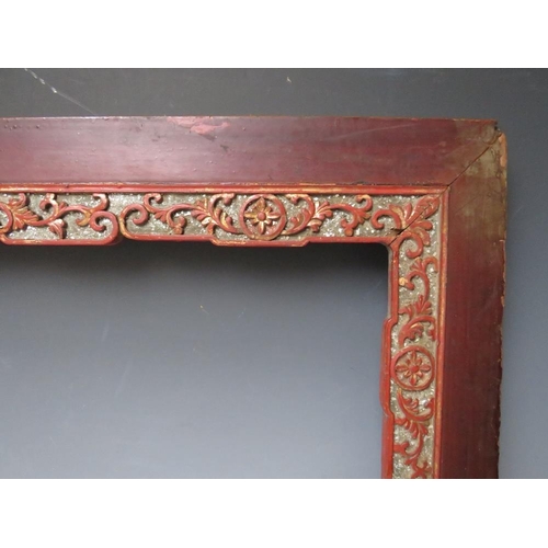 101 - A 19TH CENTURY ORIENTAL WOODEN FRAME, with decorative gold inner, frame W 9 cm, rebate 70 x 40 cm