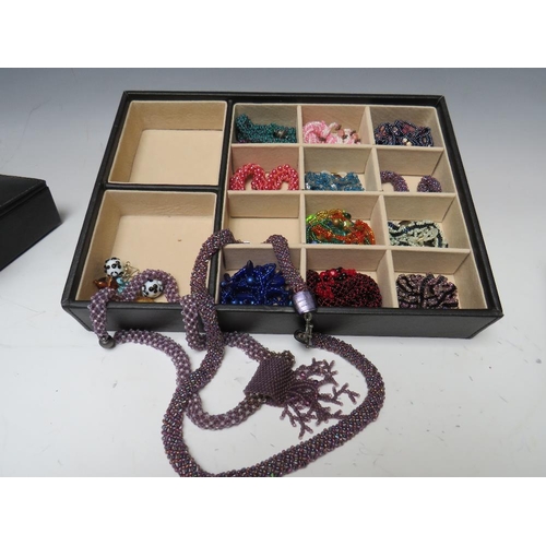 245 - A STACKING JEWELLERY BOX AND CONTENTS, comprising of approximately 40 handcrafted bead necklaces, ba... 
