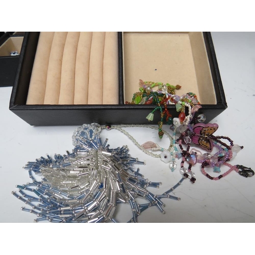 245 - A STACKING JEWELLERY BOX AND CONTENTS, comprising of approximately 40 handcrafted bead necklaces, ba... 