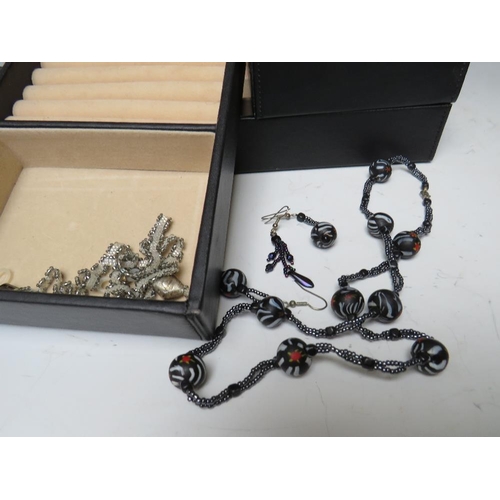 245 - A STACKING JEWELLERY BOX AND CONTENTS, comprising of approximately 40 handcrafted bead necklaces, ba... 