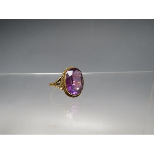 246 - A HALLMARKED 9CT GOLD AMETHYST DRESS RING, ring size P, approx 3.59 g