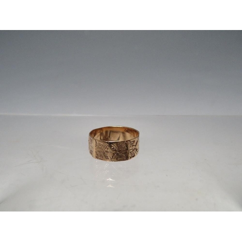 267 - A HALLMARKED 9CT GOLD RING WITH ENGRAVED DESIGN, being panel effect shape, size Q ½, approx 2.67 g