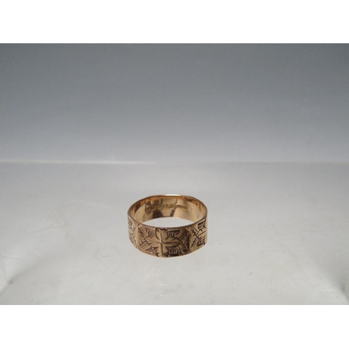 267 - A HALLMARKED 9CT GOLD RING WITH ENGRAVED DESIGN, being panel effect shape, size Q ½, approx 2.67 g