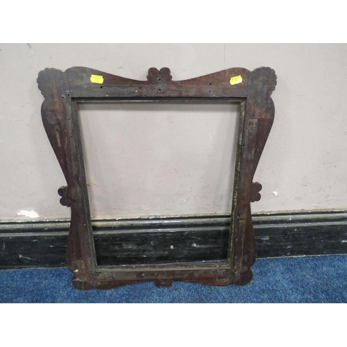 37 - A 19TH CENTURY DECORATIVE DARK HARDWOOD FRAME WITH SCROLLING, widest frame W 7.5 cm, rebate 43 x 36 ... 