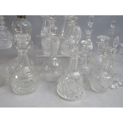 417 - A COLLECTION OF SMALL / MINIATURE GLASS DECANTERS ETC., to include a thistle shaped decanter with en... 