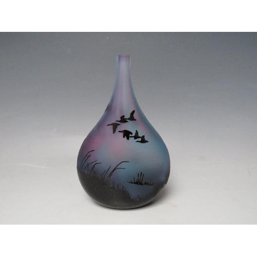 420 - AN ED BURKE E & M STUDIO GLASS SCENIC VASE, black cased, being acid etched to reveal a blue and purp... 