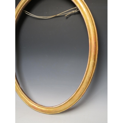 48 - A 19TH CENTURY OVAL GOLD FRAME, frame W 4 cm, rebate 62 x 47 cm